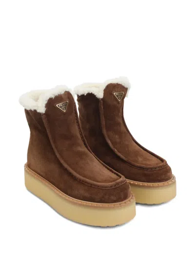 Prada Suede Shearling Ankle Boots In Brown
