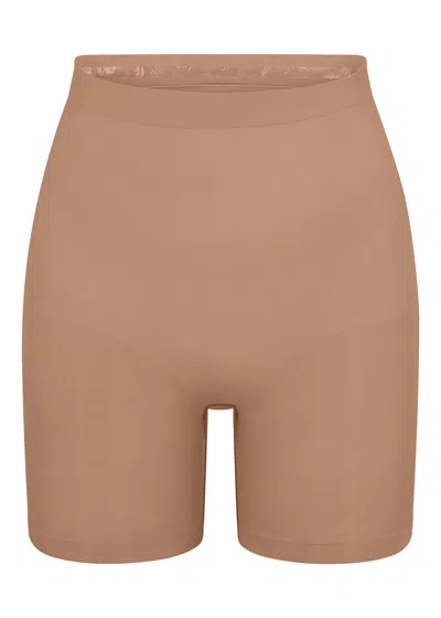 Skims Seamless Sculpt Mid-thigh Shorts In Brown
