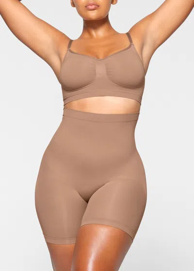 Skims Seamless Sculpt Mid-thigh Shorts In Brown