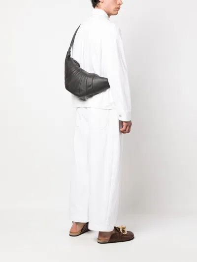 Lemaire Cross-body Bag With Adjustable Strap And Textured Finish In Black