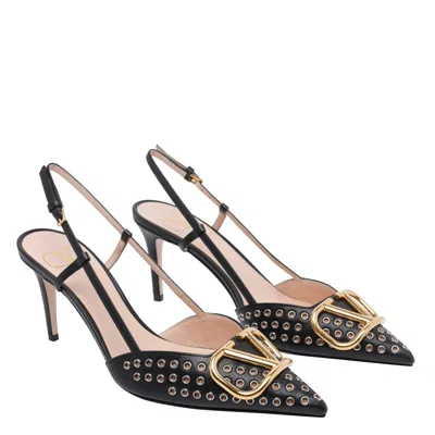 Valentino Pointed Toe Slingback Pumps Featuring Studs In Animal Print