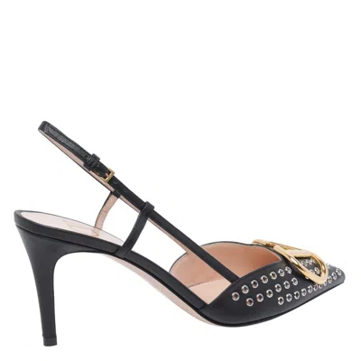 Valentino Pointed Toe Slingback Pumps Featuring Studs In Animal Print