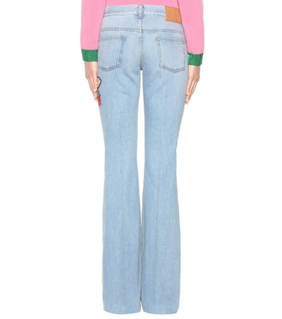 Shop Gucci Flared Jeans With Embroidered Appliqué In Light Llue