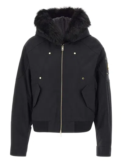 Moose Knuckles Fitted Hooded Jacket With Plush Fur Trim And Metallic Accents In Black