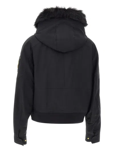 Moose Knuckles Fitted Hooded Jacket With Plush Fur Trim And Metallic Accents In Black