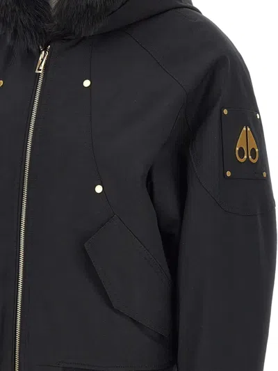 Moose Knuckles Fitted Hooded Jacket With Plush Fur Trim And Metallic Accents In Black