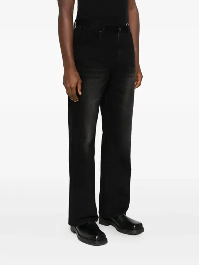 褪色效果牛仔裤