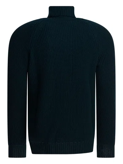 Rakkì Ribbed Roll-neck Sweater In Blue
