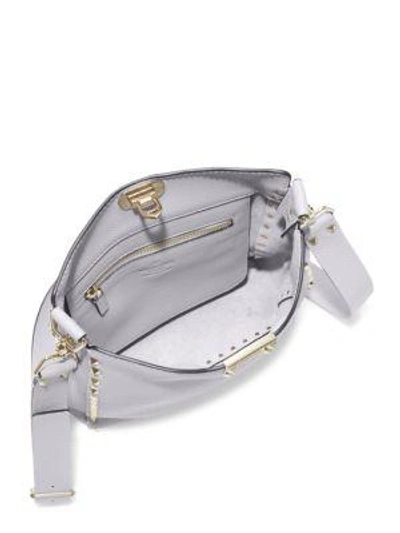 Shop Valentino Rockstud Small Leather Hobo Bag In Pastel Grey