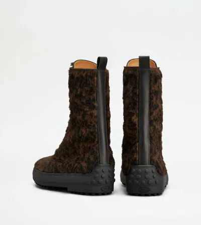 Tod's Winter Gommino Ankle Boots In Pony Effect Leather In Brown