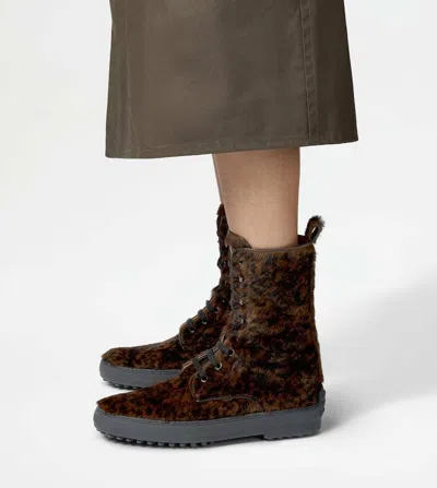 Tod's Winter Gommino Ankle Boots In Pony Effect Leather In Brown