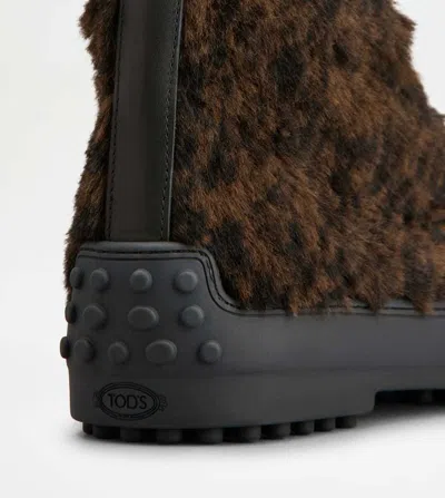 Tod's Winter Gommino Ankle Boots In Pony Effect Leather In Brown