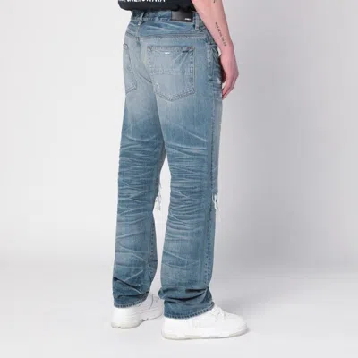 Amiri Men Blue Jeans With Ripped Details On The Front And Logo Patch On The Rear In Denim Man In Blue
