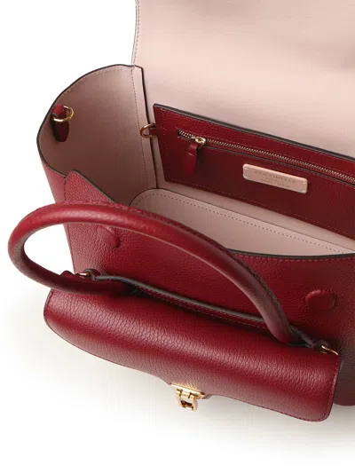 Coccinelle Double Beat Medium Leather Bag In Burgundy