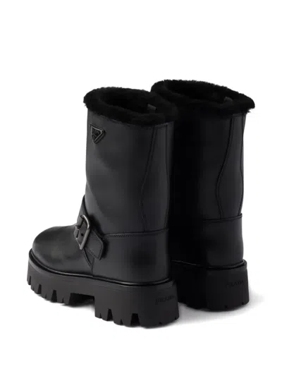 Prada Stiefeletten Aus Leder Und Lammfell In Black