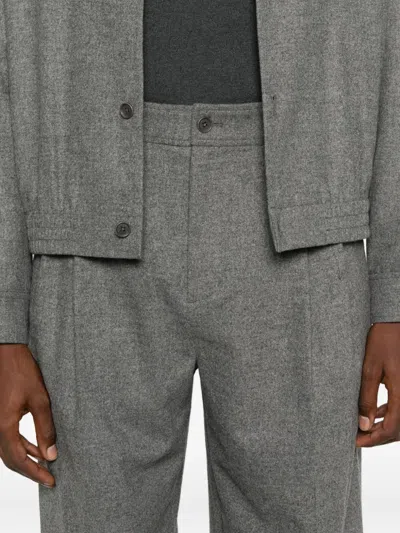 PLEATED WIDE-LEG TROUSERS