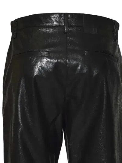 Msgm Flared Trousers With Shiny Finish And Welt Pockets In Black