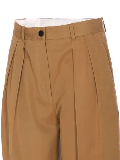 The Row Igor Button Pleated Trousers In Brown