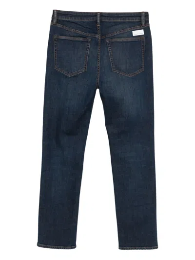 WHISKERING-EFFECT JEANS
