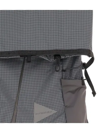 And Wander Grid-pattern Backpack In Gray