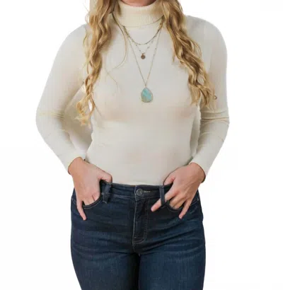 Ronnie Salloway & Company Solid Color Turtleneck Sweater In Ivory In White
