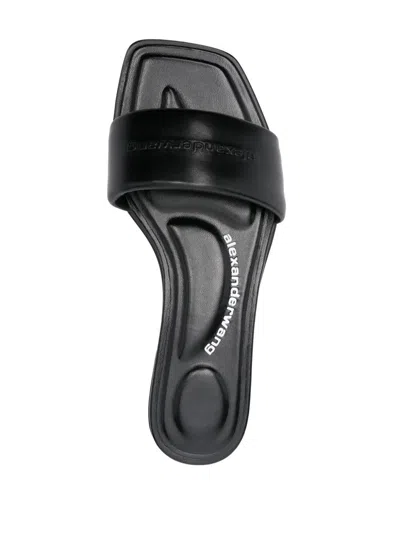 Alexander Wang Embossed-logo Slides In Black
