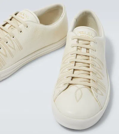 Prada Low Profile Round Toe Rubber Sole Sneakers In White