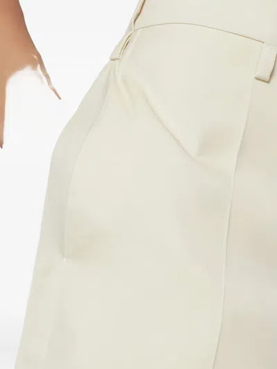 Jil Sander High Waisted Wool Skirt Featuring Slits In Neutral