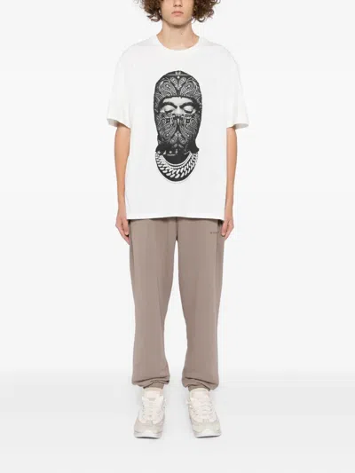 Ih Nom Uh Nit Graphic Print Crew-neck Short Sleeve T-shirt In White