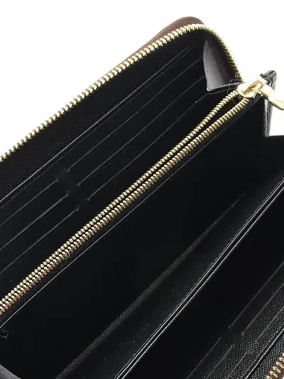 Pre-owned Louis Vuitton 2021-2025 Monogram Giant Reverse Zippy Wallet Long Wallets In Brown