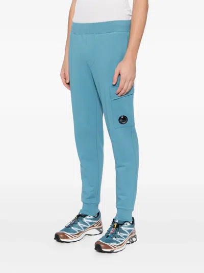 C.p. Company Logo-plaque Cotton Track Pants In Blue