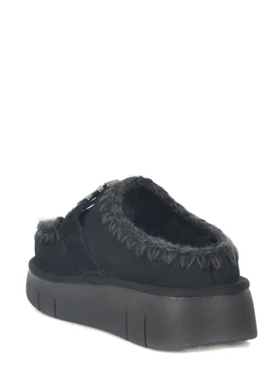 Mou Bounce Black Mules With Logo Lettering And Open Rear In Suede Woman In Black