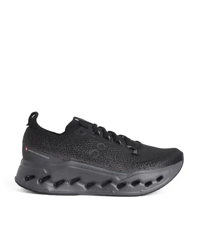 On Cloudsurfer Max Trainers In Black