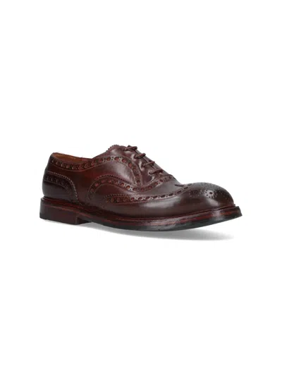 Premiata Brogues With Leather Sole And Round Toe In Brown
