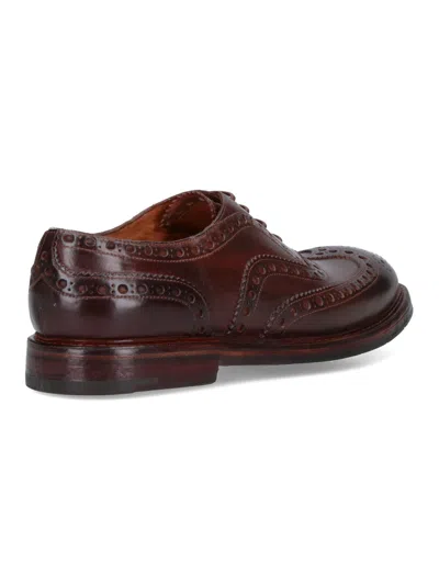 Premiata Brogues With Leather Sole And Round Toe In Brown