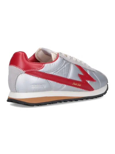 Moa Master Of Arts Shiny Silver Sneakers With Bold Red Lightning Detailing In Silver