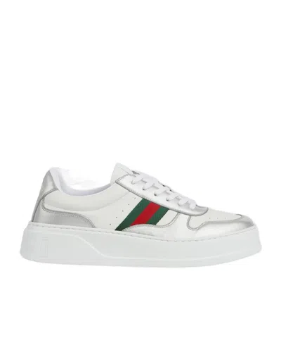 Gucci Low-top Leather Sneakers Featuring Metallic Accents And Rubber Sole In White