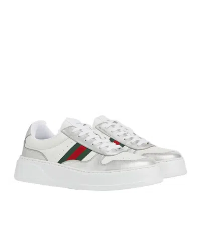 Gucci Low-top Leather Sneakers Featuring Metallic Accents And Rubber Sole In White