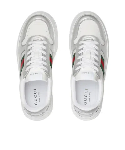 Gucci Low-top Leather Sneakers Featuring Metallic Accents And Rubber Sole In White