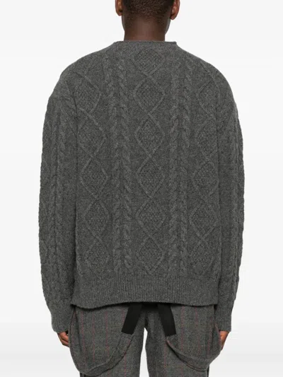 A Tentative Atelier Cable Knit Sweater In Black