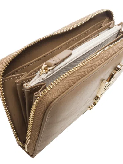 V73 Logo-plaque Zip-around Wallet In Brown