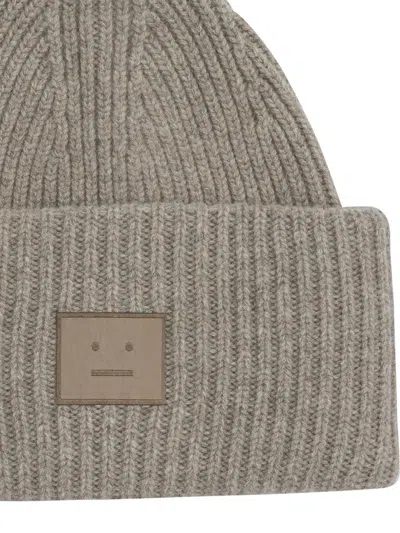 Acne Studios Pansy Face Ribbed Wool-blend Beanie In Brown