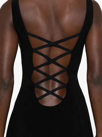 Norma Kamali Asymmetric Hem Sleeveless Evening Gown In Black