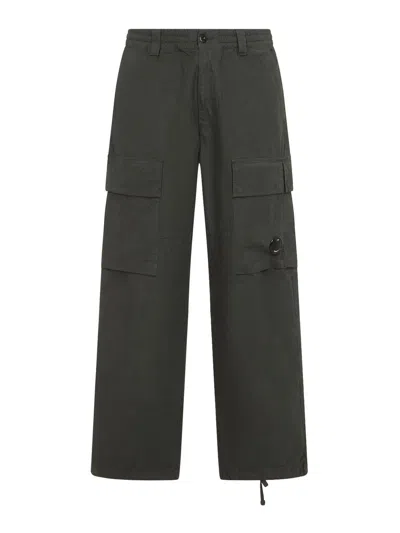 C.p. Company Cargo Trousers With Distinctive Lens Detail And Adjustable Hem In Green