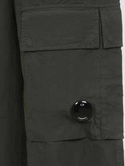 C.p. Company Cargo Trousers With Distinctive Lens Detail And Adjustable Hem In Green