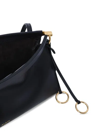 Alaïa Le Click Small Shoulder Bag In Glossy Leather