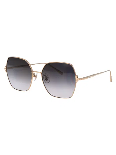 Chopard Gold Titanium Sunglasses In Black