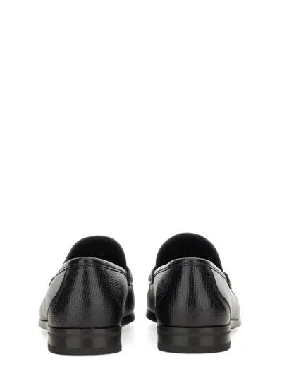 Ferragamo Gandioso Pebbled Moccasin With Gancini Ornament In Black Leather