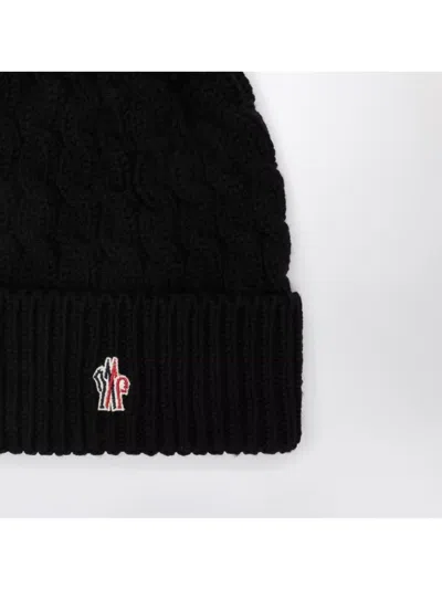 Moncler Wool Hat Featuring Cable Knit And Pom Detail In Black
