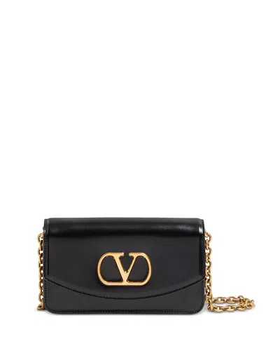 Valentino Garavani Vain Small Vlogo Leather Clutch Bag In Black